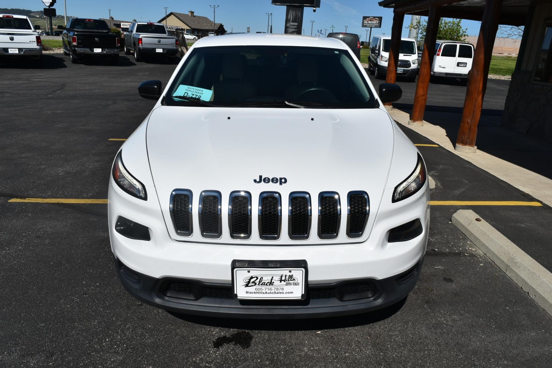 2016 White /Black Jeep Cherokee Sport (1C4PJMAB3GW) with an 2.4L 4 Cyl Multi-Air engine, 9-Speed Automatic transmission, located at 1600 E Hwy 44, Rapid City, SD, 57703, (605) 716-7878, 44.070232, -103.171410 - Photo #1